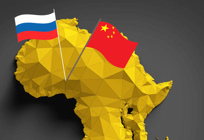 Una mappa del Sahel con le bandiere di Russia e Cina impiantate sopra il Niger